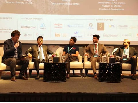 Naveen Sharma, Founder & Chairman, Taxation Society in UAE (second from left), Sheetal Soni, Partner, MICS International DMCC, Jaison Mandapathil, Manager, Compliance & Assurance, Hussain Al Shemsi Chartered Accountants, and Muneer Al Wafaa, Founder and CEO, Al Wafaa Group, during a panel discussion at Invest UAE seminar 