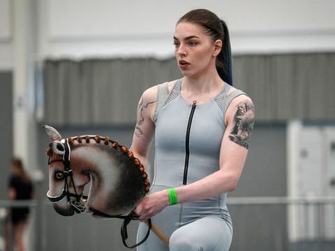 A participant competes in the dressage category of the Finnish Hobbyhorse Championships 2024 at the local sport arena in Seinäjoki, Finland.