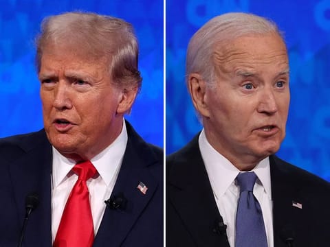 US President Joe Biden (R) and Republican presidential candidate, former US President Donald Trump participate in the CNN Presidential Debate at the CNN Studios on June 27, 2024 in Atlanta, Georgia. 