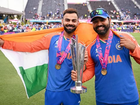 India’s captain Rohit Sharma (right) and Virat Kohli pose with the T20 World Cup after beating South Africa by seven runs in the final at Kensington Oval in Barbados on June 29, 2024. Rohit and Kohli retired from T20 Internationals after the match.