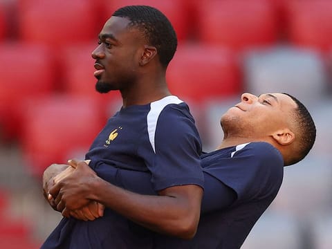 France's Youssouf Fofana (left) and Kylian Mbappe take part in a training session at the Munich Football Arena.