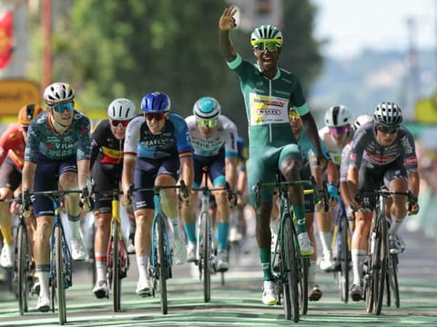 Intermarche - Wanty team's Eritrean rider Biniam Girmay wearing the sprinter's green jersey sprints past the finish line to win the 12th stage of the 111th edition of the Tour de France cycling race on Thursday.