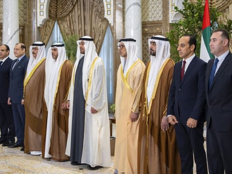 His Highness Sheikh Mohamed bin Zayed Al Nahyan, President of the United Arab Emirates (5th L); His Highness Sheikh Mansour bin Zayed Al Nahyan, UAE Vice President and Deputy Prime Minister (6th L); Abdullah bin Sultan bin Awad Al Nuaimi, UAE Minister of Justice (4th L), and Mohamed Hamad Al Badi, President of the UAE Federal Supreme Court (7th L), stand for a photograph with newly appointed Judges during an oath ceremony at Qasr Al Watan. 