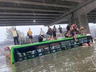 Typhoon triggers flooding in Metro Manila, Bulacan as some residents seek rescue  