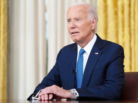 US President Joe Biden speaks during an address to the nation about his decision to not seek reelection, in the Oval Office at the White House in Washington, DC, on July 24, 2024. 