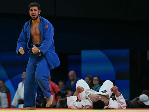 UAE's Aram Grigorian reacts after beating Uzbekistan's Davlat Bobonov in the judo men's -90kg round of 32 bout in Paris Olympics on Wednesday.