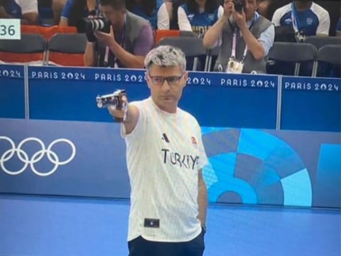 Turkish shooter Yusuf Dikec in action during the 10-metre pistol mixed team shooting event at the Paris Games.