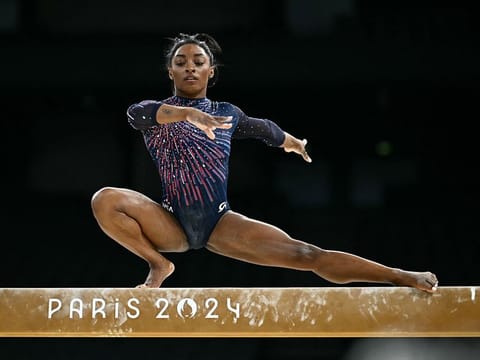 US' Simone Biles takes part in an artistic gymnastics training session at the Bercy Arena in Paris on July 25, 2024, ahead of the Paris 2024 Olympic Games. 