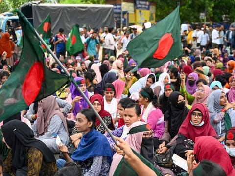 Bangladesh students block roads, demanding a merit-based system for civil service jobs in Dhaka on July 10, 2024. The protests snowballed over several weeks, leading to the resignation and flight of Prime Minister Sheikh Hasina from the country. 