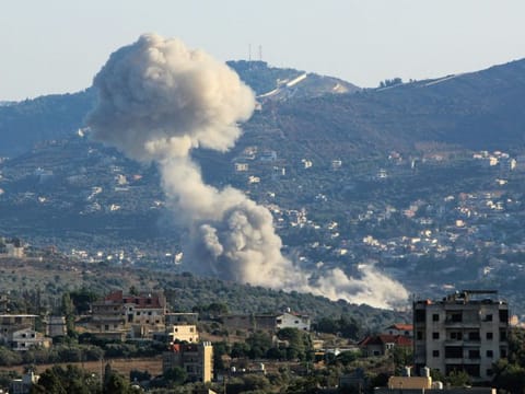 Smoke billows from the site of an Israeli strike on the southern Lebanese village of Kfar Kila on August 6, 2024.  