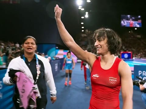 India's Vinesh Phogat, who is celebrating her victory in the women's freestyle 50kg wrestling semifinals, has been disqualified.