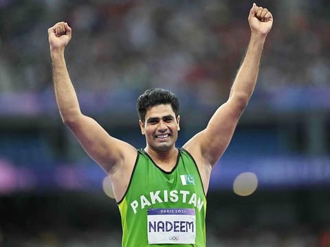 Pakistan's Arshad Nadeem reacts as he competes in the men's javelin throw final of the athletics event at the Paris 2024 Olympic Games at Stade de France in Saint-Denis, north of Paris, on August 8, 2024. 