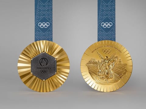 The gold medal at the 2024 Paris Olympics. The Eiffel Tower is an integral part of each medal, which is set with a piece of original iron from the iconic monument of France and Paris.