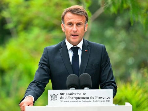 France's President Emmanuel Macron delivers a speech during a ceremony marking the 80th anniversary of the Allied landings in Provence during World War II, at the Boulouris National Cemetery ("necropole nationale") in Boulouris-sur-Mer, south eastern France, on August 15, 2024.
