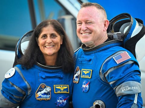 File photo of NASA astronauts Butch Wilmore (R) and Suni Williams 