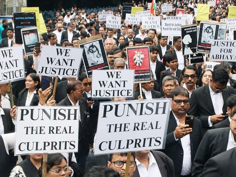 Advocates stage a protest demanding justice for the victim of Kolkata's RG Kar Hospital Tragedy, in Kolkata on Monday