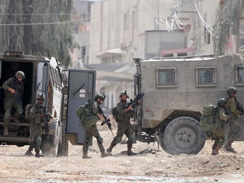Israeli soldiers operate during a raid in the Nur Shams camp for Palestinian refugees near the city of Tulkarem in the Israeli-occupied West Bank on August 28, 2024. 