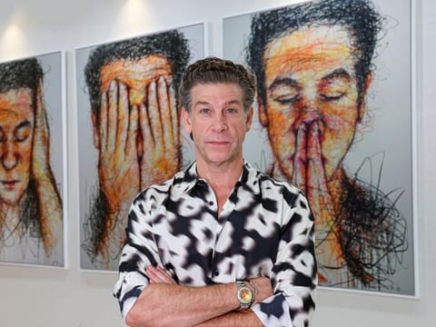 A man of many interests: Dr Adel Quttainah at the Quttainah Specialised Hospital in Dubai. A well-known plastic surgeon, he says he sources his collection of medical antiques, art and supercars from different parts of the world. 