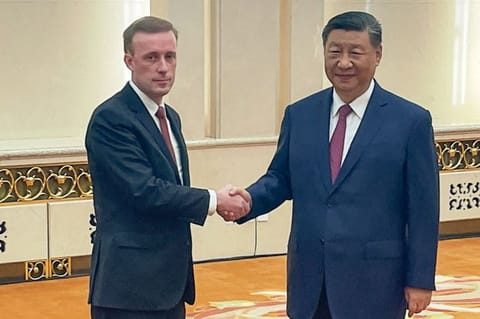 US National Security Advisor Jake Sullivan shakes hands with China's President Xi Jinping (right) during their meeting at the Great Hall of the People in Beijing on August 29, 2024. 
