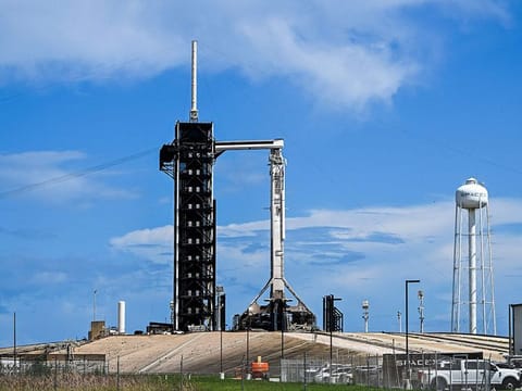 A SpaceX Falcon 9 rocket with the Crew Dragon Resilience capsule sits on Launch Complex 39A at Kennedy Space Center ahead of the Polaris Dawn Mission in Cape Canaveral, Florida.