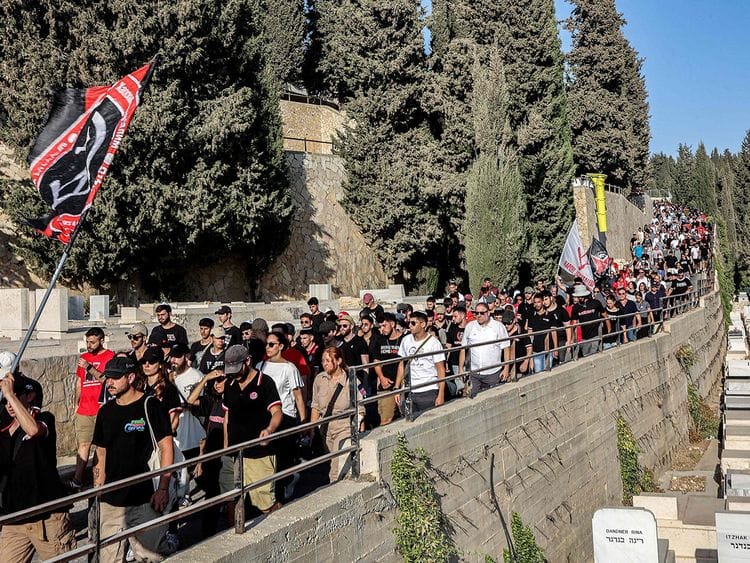 Mourners march during the funeral of killed US-Israeli hostage Hersh Goldberg-Polin whose body was recovered with five other hostages in Gaza, in Jerusalem, on September 2, 2024.
