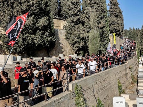 Mourners march during the funeral of killed US-Israeli hostage Hersh Goldberg-Polin whose body was recovered with five other hostages in Gaza, in Jerusalem, on September 2, 2024.