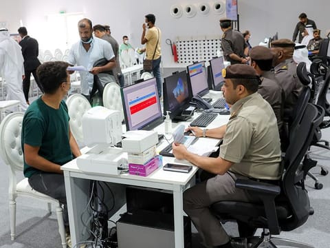 Amnesty applicants queue up at a GDRFA counter in Al Awir on the second day of Amnesty programme. 