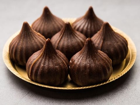 Celebrate the Ganesh festival with a delightful twist on tradition: Chocolate Modak!