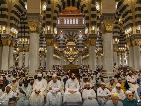 Worshippers gather for congregation prayers in the Prophet's Mosque in Medina.  