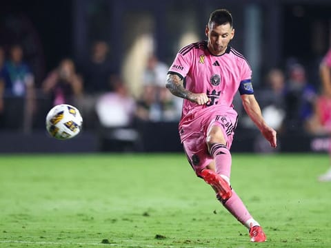 Lionel Messi #10 of Inter Miami kicks a free kick against the Philadelphia Union during the second half of the game at Chase Stadium.