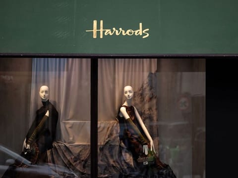 Mannequins in the window of the Harrods luxury department store in London, UK.