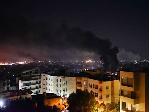 Smoke billows from the site of an Israeli airstrike that targeted a neighborrhood in Beirut’s southern suburb early on September 28, 2024. 