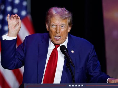 Former US President and Republican presidential candidate Donald Trump delivers remarks at the Prairie du Chien Area Arts Center in Prairie du Chien, Wisconsin.