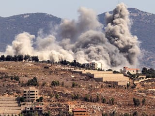 Smoke clouds erupt during an Israeli airstrike on Khiam in southern Lebanon near the border with Israel. The Hezbollah militia, an Iran-backed proxy, has rejected the US-brokered ceasefire talks between Israel and Lebanon and says it will "not accept any deal" emerging from them.