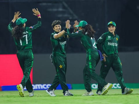 Pakistan players celebrate the wicket of Kavisha Dilhari of  Sri Lanka in the second match of ICC  Women's T20 World Cup at Sharjah Cricket Stadium on Thursday. 