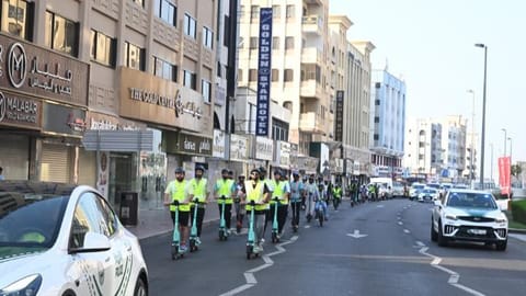 The Dubai Police e-scootercade on Bani Yas Street in Dubai.