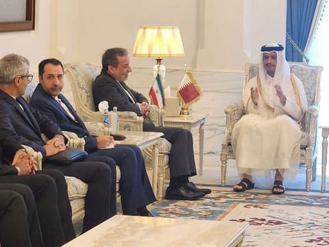 Qatar's Prime Minister and Minister of Foreign Affairs Sheikh Mohammed bin Abdulrahman bin Jassim Al Thani with Iran's Foreign Minister Abbas Araghchi and a delegation in Doha on October 10, 2024.  