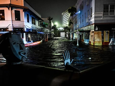 Water-flooded streets are seen after Hurricane Milton made landfall in Fort Myers, Florida, on October 9, 2024