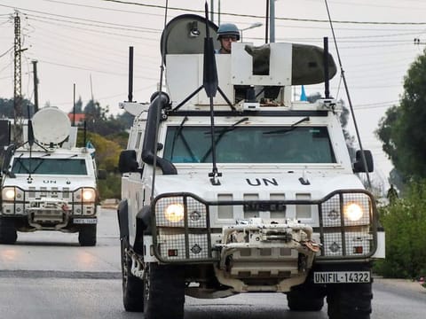 Vehicles of the United Nations Interim Force in Lebanon (UNIFIL) patrol in Marjeyoun in southern Lebanon on October 11, 2024, amid the ongoing war between Hezbollah and Israel.  
