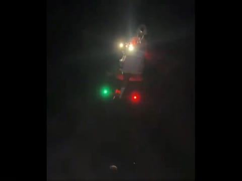 Still from police video showing the helicopter during the rescue 