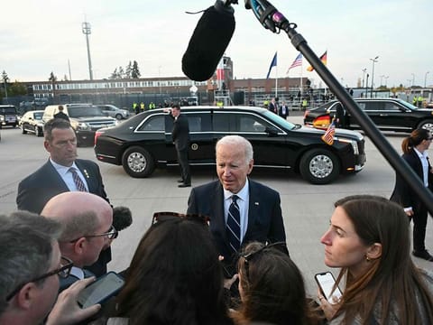 US President Joe Biden speaks to journalists before boarding Air Force One at Berlin-Brandenburg Airport (BER) in Schoenefeld, southeast of the German capital, on October 18, 2024, at the end of his state visit to Germany.  