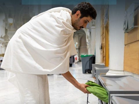 Worshippers at the Grand Mosque are advised to place their shoes at designated places.