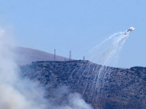 Smoke billows following Israeli bombardment on the hills of the Lebanese village of Kafarshouba in southern Lebanon on October 19, 2024, amid the ongoing war between Hezbollah and Israel.  