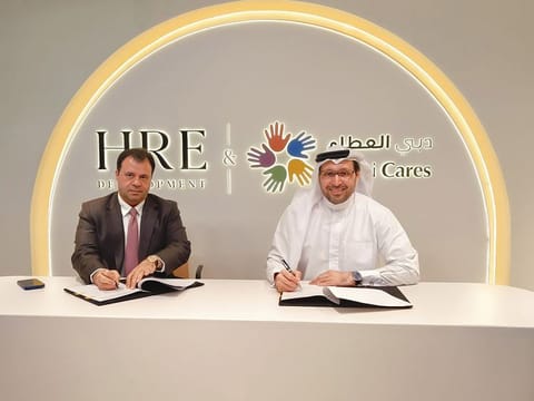 (R) Dr Tariq Al Gurg, CEO and Vice-Chairman of Dubai Cares and Mohamed Adib Hijazi, Chairman, HRE Development during the signing ceremony