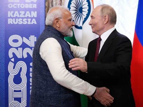 Russia's President Vladimir Putin meets with Indian Prime Minister Narendra Modi on the sidelines of the BRICS summit in Kazan on October 22, 2024.  