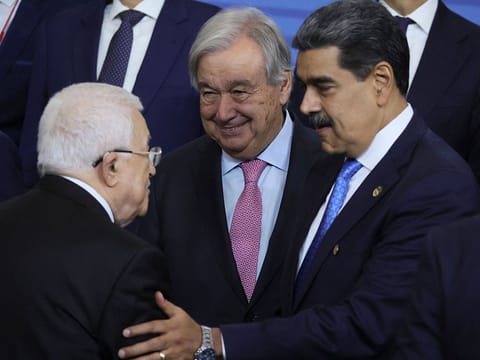 Palestinian President Mahmoud Abbas, UN Secretary General Antonio Guterres, Venezuelan President Nicolas Maduro and other participants in the outreach/BRICS Plus format meeting pose for a family photo during the BRICS summit in Kazan on October 24, 2024. 