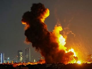 Israel pounds Beirut, levels residential complex