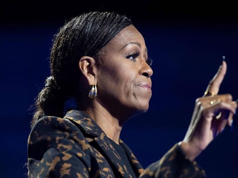 US First Lady Michelle Obama speaks during a campaign rally with US Vice President and Democratic presidential candidate Kamala Harris at the Wings Event Center in Kalamazoo, Michigan, October 26, 2024. 