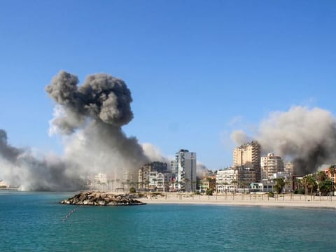 Smoke billows from the site of Israeli airstrikes on a neighbourhood in the southern Lebanese city of Tyre on October 28, 2024.  