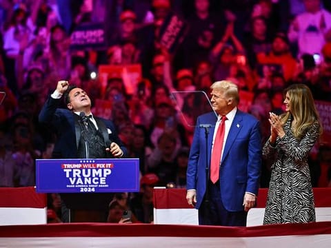 Former US President and Republican presidential candidate Donald Trump and his wife former US First Lady Melania Trump at Madison Square Garden in New York, October 27, 2024. 